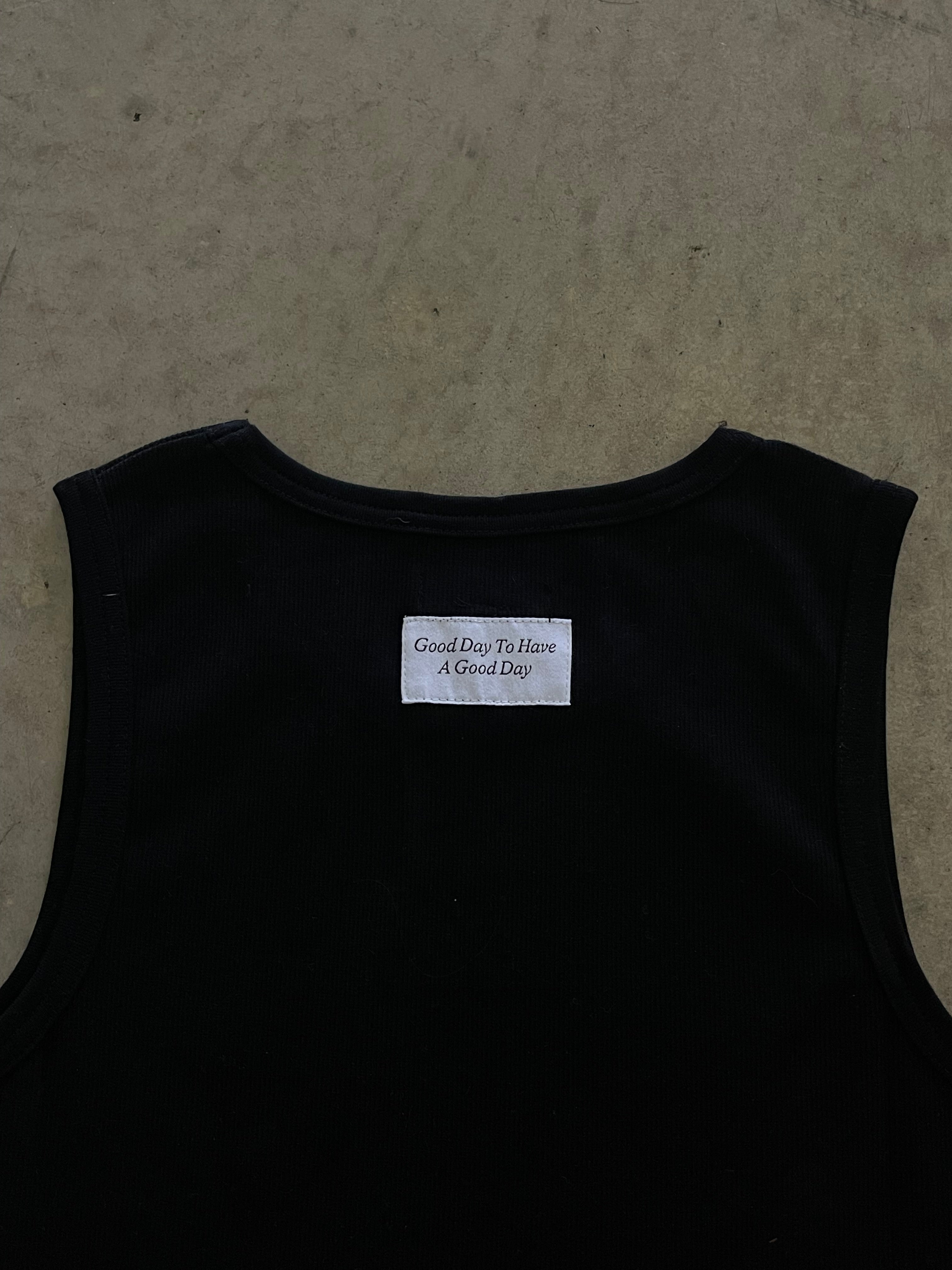 002 Woven Black Singlet