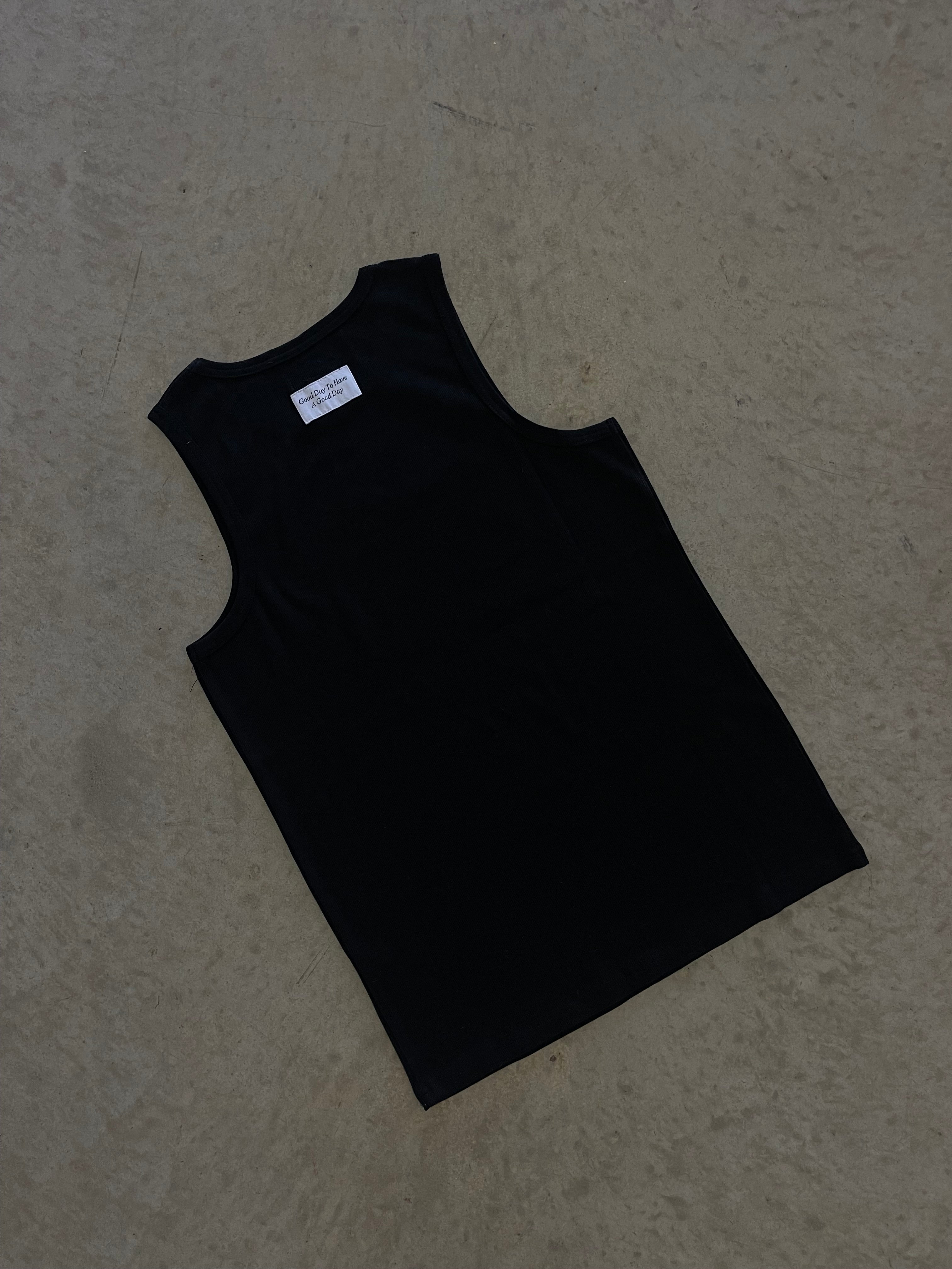 002 Woven Black Singlet