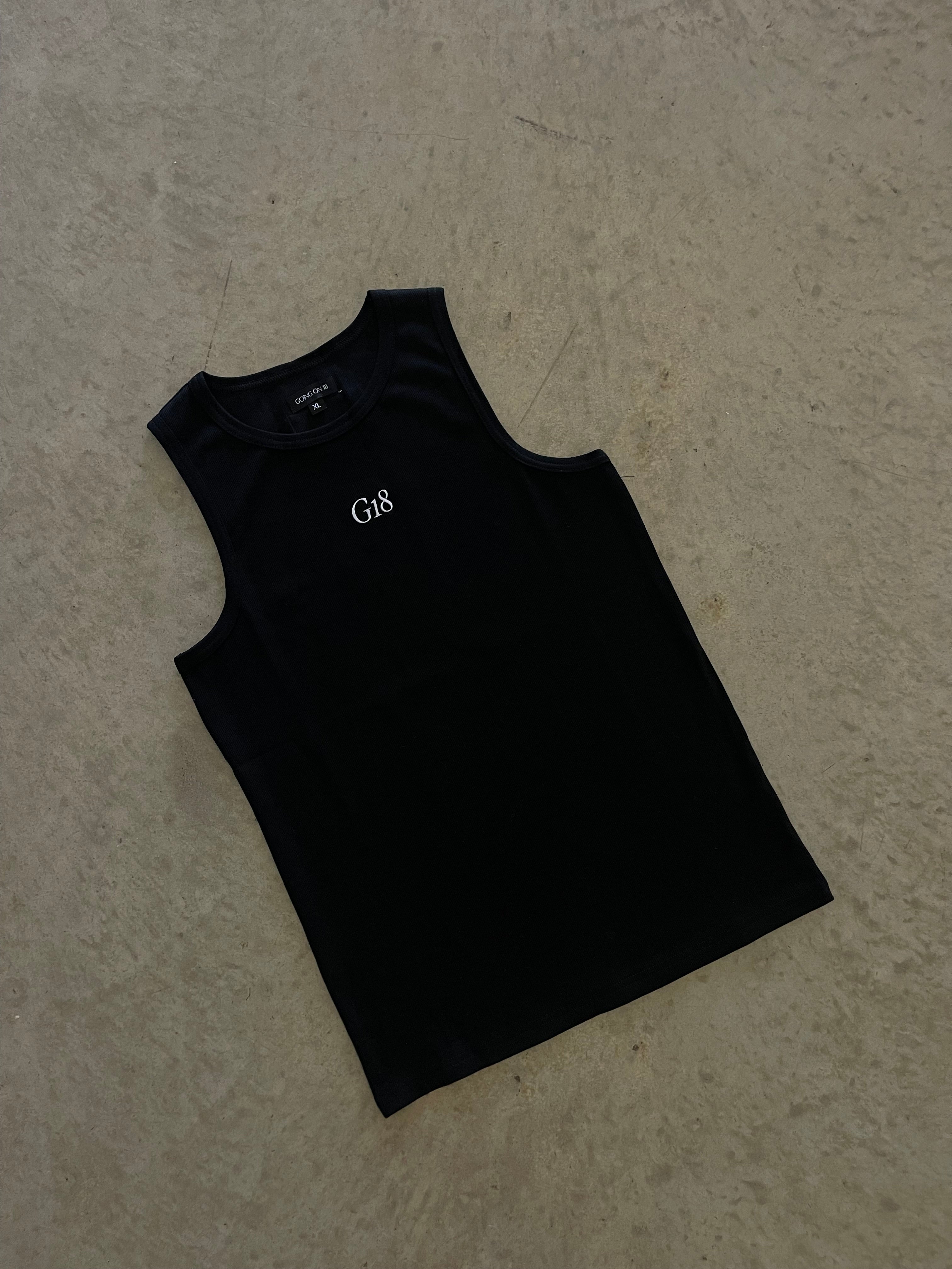 002 Woven Black Singlet